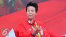 Atlet bulu tangkis Liliyana Natsir saat berbagi cerita keseruan bersama SCTV dan Liputan6.com di Jakarta, Kamis (25/8). Liliyana menceritakan ketegangan saat berlaga di final dan berhasil meraih medali emas untuk Indonesia. (Liputan6.com/Angga Yuniar)