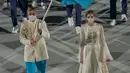 Pada malam pembukaan olimpiade (23/07/2021), Olga tampil elegan dalam balutan dress putih berhiaskan sulaman. (Instagram/olympickz).