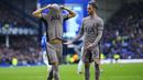 <p>Pemain Tottenham Hotspur, Richarlison (kiri) menutup wajahnya dengan jersey setelah mencetak gol kedua timnya ke gawang Everton pada laga lanjutan Liga Inggris 2023/2024 Goodison Park stadium, Liverpool, Inggris, Minggu (04/02/2024) dini hari WIB. (AP Photo/Jon Super)</p>