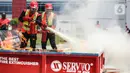 Peserta saat mengikuti Jakarta Fire Safety Challengge (JFSC) tahun 2022 di Lapangan Kantor Dinas Penanggulangan Kebakaran dan Penyelamatan (Gulkarmat), Duri Pulo, Jakarta Pusat, Selasa (9/8/2022). Kegiatan ini diikuti oleh 101 kontingen dari petugas Manajemen Keselamatan Kebakaran Gedung (MKKG) dan Manajemen Keselamatan Kebakaran Lingkungan (MKKL) di wilayah DKI Jakarta. (Liputan6.com/Johan Tallo)