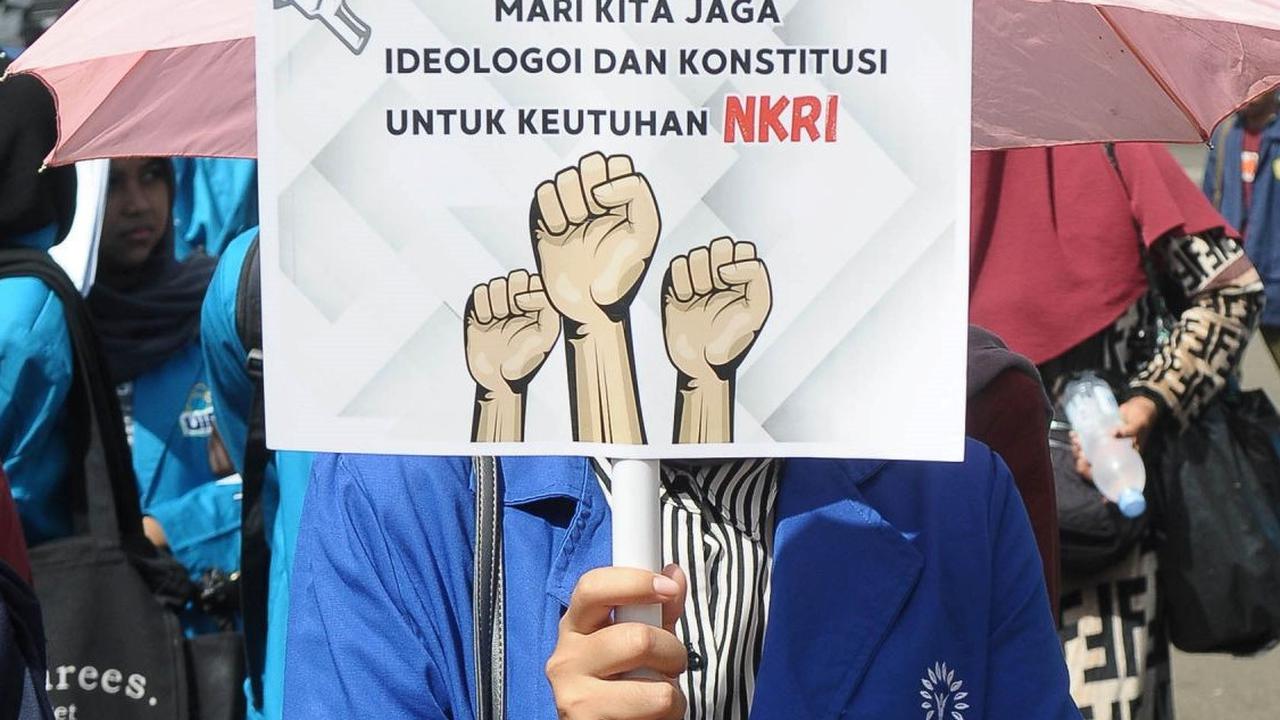 FOTO: Aksi Pemilu Damai 2024: Mahasiswa se-Indonesia Serukan Stop Berita Hoaks, Kecurangan Pemilu hingga Money Politik di Patung Kuda