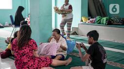 Hingga pukul 09.00 WIB, Badan Penanggulangan Bencana Daerah (BPBD) DKI Jakarta mencatat 67 RT terendam banjir. (Liputan6.com/Herman Zakharia)