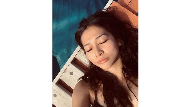 Saat berlibur, Mey Chan juga memilih untuk tampil tanpa makeup.