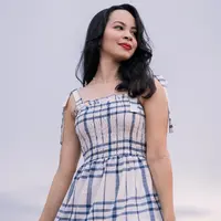 ilustrasi perempuan tersenyum/Photo by Junior REIS on Unsplash
