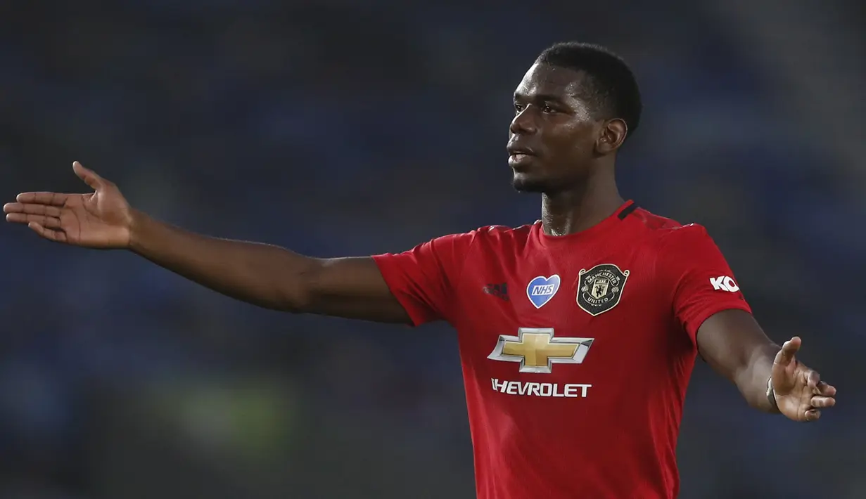 5. Paul Pogba - Pogba merupakan salah satu gelandang box to box terbaik di Premier League saat ini. Meski Pemain berusia 27 tahun ini mampu kembali tampil impresif usai mengalami cedera lama dan menyumbangkan 1 gol serta 4 assist dari 14 laganya bersama Manchester United. (AFP/Alastair Grant/pool)