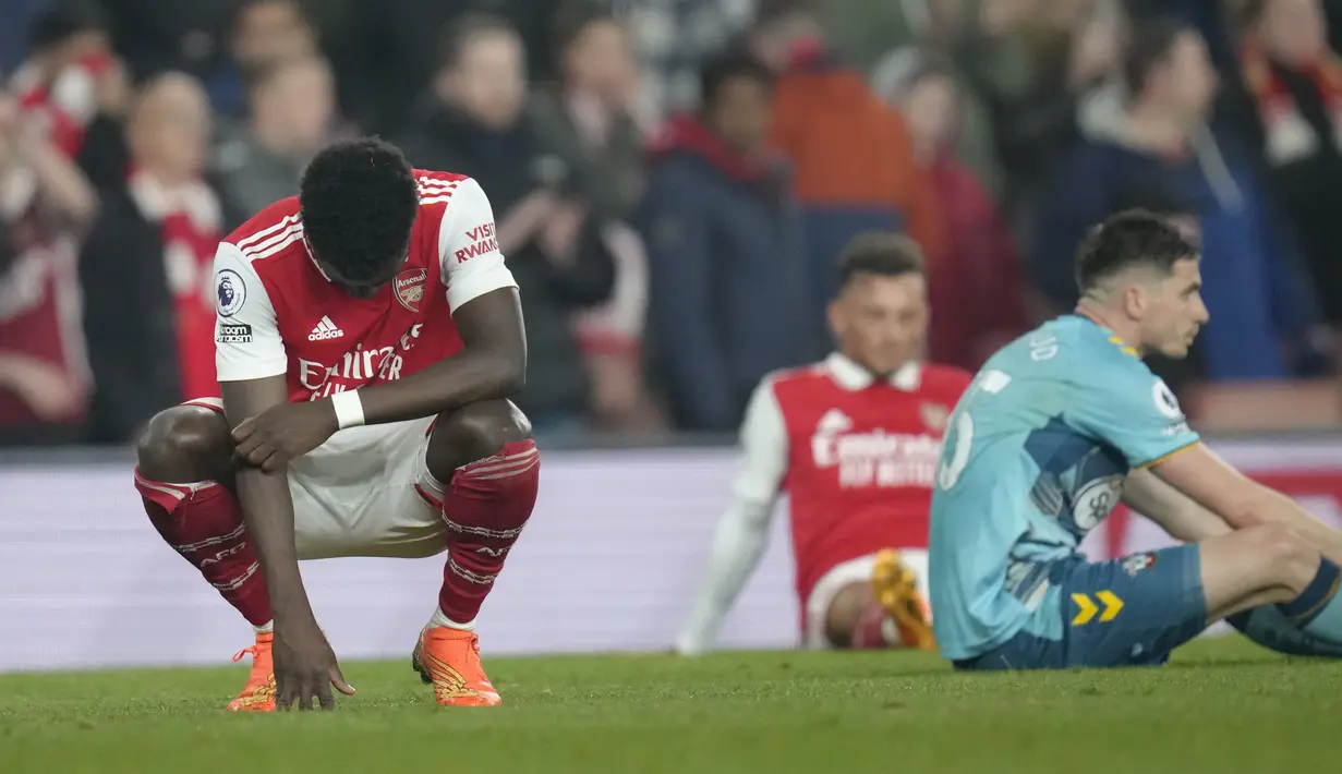 <p>Dengan hasil imbang ini, Arsenal unggul lima poin atas pesaing terdekat, Manchester City, namun mereka sudah memainkan dua pertandingan lebih banyak. (AP Photo/Kirsty Wigglesworth)</p>