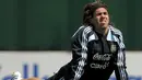 Argentina's footballer Carlos Tevez stretches during a training session in Ezeiza, Buenos Aires on October 9, 2008. AFP PHOTO/Juan MABROMATA