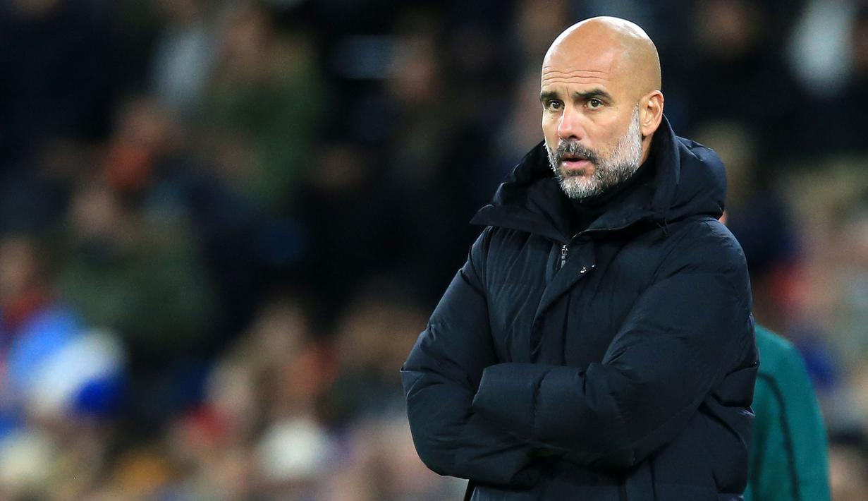 Pep Guardiola - Pelatih berkepala plontos ini telah mempersembahkan banyak trofi dan membawa Manchester City menjelma menjadi klub elit di Eropa. Menukangi City sejak Juli 2016 Pep telah memenangi 231 laga dari 312 pertandingan. (AFP/Lindsey Parnaby)