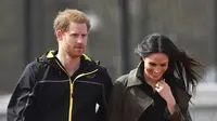 Bukan Barang Mewah, Ini Kado Perkawinan yang Diminta Pangeran Harry dan Meghan Markle (BEN STANSALL / AFP)