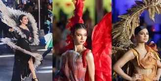 Yuki Kato tampil merah merona bak burung phoenix, mengenakan gaun dan sayap merah, serta makeup art deco yang seru. [Instagram/nasionp]