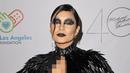 <p>Vanessa Hudgens menghadiri Pesta Halloween "Thriller Night" yang diselenggarakan oleh Prince Michael Jackson di Jackson Family Home, Encino, California, Amerika Serikat, 28 Oktober 2022. Beberapa helai bulu mengalir ke bagian bawah dan menumpuk pada bagian bawah gaun. (Kevin Winter/Getty Images/AFP)</p>