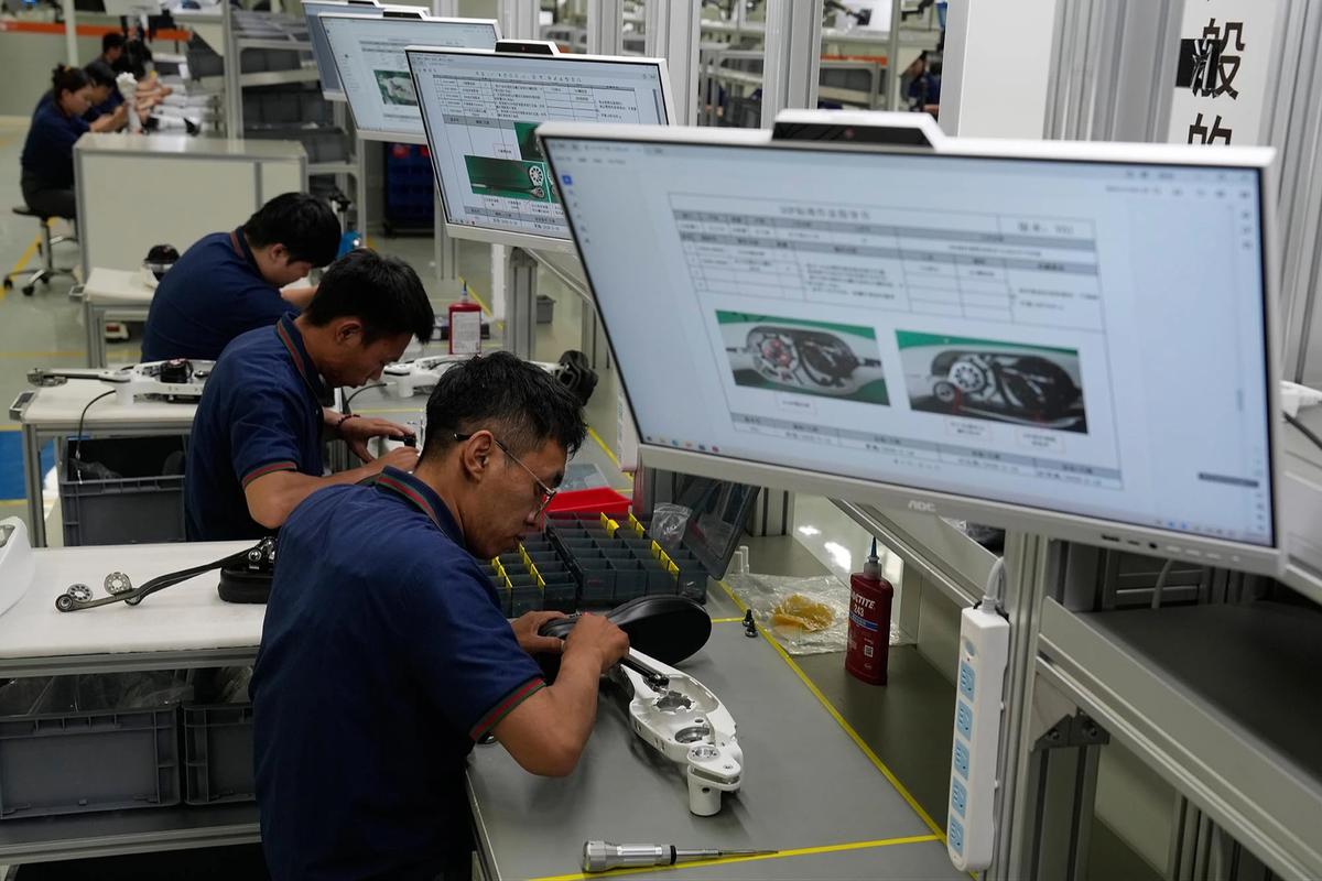 FOTO: Melihat Pabrik Robot Masa Depan di Beijing