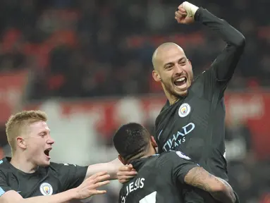 Ekspresi pemain Manchester City, David Silva usai membobol gawang Sotke City pada lanjutan Premier League di Bet 365 Stadium, Stoke, (13/3/2018). Manchester City menang 2-0. (AP/Rui Vieira)