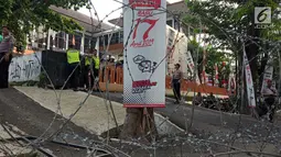 Ratusan massa mengelar aksi di Perempatan Jalan Pahlawan Semarang,  Jumat (10/5). Mereka menuntut kejujuran penghitungan suara KPU pada Pemilu 2019. (Liputan6.com/Gholib)