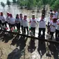 Gerakan penanaman mangrove seretak di Tanjung Api-api Kabupaten Banyuasin Sumsel (Dok. Humas PKK Sumsel / Nefri Inge)