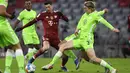 Mesin Gol Bayern Munchen itu membukukan gol terakhir Die Roten di tiga menit terakhir pada laga melawan Wolfsburg di Allianz Arena. (AP Photo/Andreas Schaad)