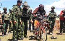 Momen Langka di Pedalaman Papua: Ribuan Warga Sambut Bantuan Presiden di Kuyawage
