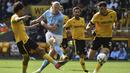 Erling Haaland kembali mencetak gol kala Manchester City bertandang ke markas Wolverhampton dalam pekan ketujuh Premier League 2022/2023, Sabtu (17/9/2022). Haaland mencetak satu gol dan mencatatkan rekok baru di Liga Inggris. (AP Photo/Rui Vieira)