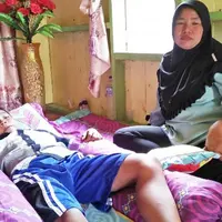 Inilah cerita aksi heroik seorang ibu yang menyelamatkan anaknya yang tengah diterkam oleh buaya.  (Foto: Joni Hartanto/Jambi Ekspres/Jawa Pos Group)