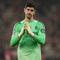 Kiper Real Madrid, Thibaut Courtois, meninggalkan lapangan setelah pertandingan Liga Champions antara Liverpool dan Real Madrid di Liverpool, Inggris, Rabu (5-11-2025) dini hari WIB. (Foto AP/Jon Super)