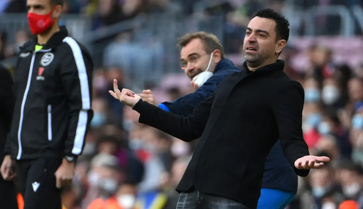 Xavi Hernandez. Kembali ke Barcelona sebagai pelatih tentu menjadi tantangan tersendiri bagi gelandang yang sempat memperkuat Barcelona selama 17 musim, 1998/1999 hingga 2014/2015. Di tangannya Barcelona malah gagal lolos ke babak 16 Besar Liga Champions pertama kali dalam 21 tahun. (AFP/Lluis Gene)