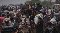 Badan Perserikatan Bangsa Bangsa untuk Pengungsi Palestina (UNRWA) melaporkan bahwa warga sipil di Jalur Gaza menjadi sasaran serangan pasukan Israel saat berupaya mendapatkan makanan di pusat distribusi bantuan Rafah. (AP Photo/Abdel Kareem Hana)