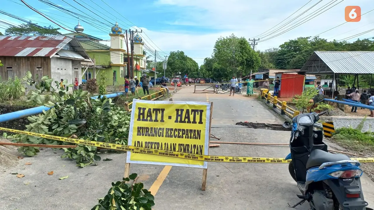 Jembatan Rampoang putus, akses Jalur Trans Sulawesi lumpuh total (Liputan6.com/Fauzan)