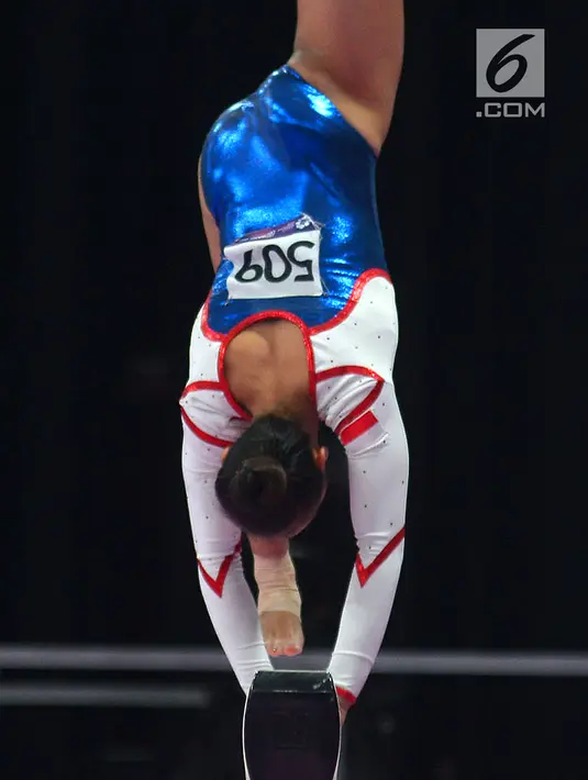Pesenam putri Indonesia saat berlaga pada babak final senam artistik putri Asian Games 2018 di JIExpo, Kemayoran, Jakarta, Rabu (22/8). Indonesia berhasil menempati posisi ke 8 dari 11 negara dengan skor 140,85. (merdeka.com/Imam Buhori)