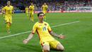 Pemain Rumania, Bogdan Stanciu melakukan selebrasi usai mencetak gol ke gawang Prancis saat laga perdana Euro 2016 di Stade de France, Prancis (11/6). Prancis menang dengan skor 2-1. (Reuters/ Darren Staples)