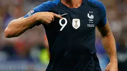 Striker Prancis, Oliver Giroud berselebrasi usai mencetak gol ke gawang Belanda pada pertandingan UEFA Nations League di Stadion Stade de France, Saint-Denis, Prancis, (9/10). Prancis menang 2-1 atas Belanda. (AP Photo/Christophe Ena)