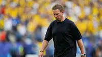 Pelatih Jerman, Julian Nagelsmann, berjalan meninggalkan lapangan setelah pertandingan Grup E Piala Dunia antara Ekuador dan Jerman di East Rutherford, New Jersey, dekat New York, Kamis (25/6/2026). (AP Photo/Steve Luciano)