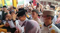 Menteri Pariwisata dan Ekonomi Kreatif (Menparekraf), Sandiaga Uno turut hadir dalam rangkaian acara Lebaran Betawi yang diselenggarakan di kawasan Monas, Jakarta Pusat, Minggu (21/5/2023). (Merdeka.com/Rahmat Baihaqi)
