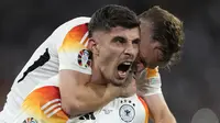 Pemain Jerman, Kai Havertz melakukan selebrasi setelah mencetak gol ketiga timnya ke gawang Skotlandia pada laga pembuka Grup A Euro 2024 di Allianz Arena, Munchen, Jerman, Sabtu (15/06/2024) WIB. (AP Photo/Matthias Schrader)