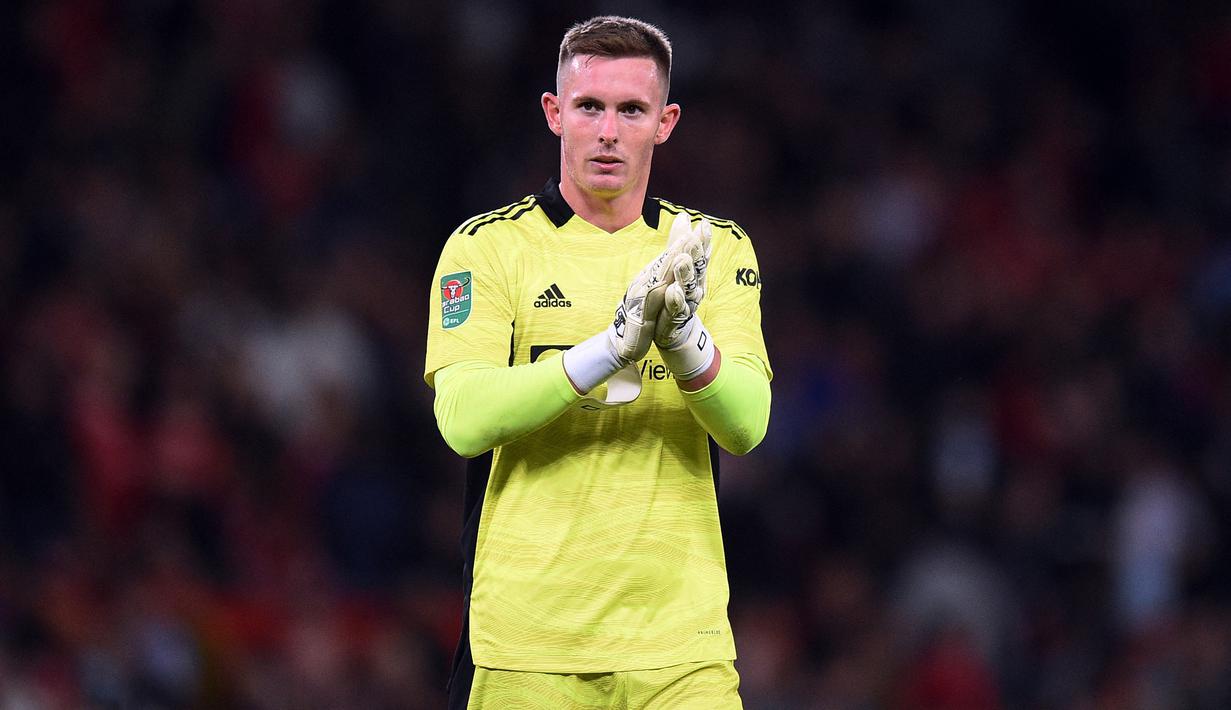 Dean Henderson. Kiper berusia 24 tahun yang memasuki musim ke-6 di Manchester United ini sama sekali belum bermain di Liga Inggris musim ini. Dijanjikan bermain di Piala FA oleh Ralf Rangnick menghadapi Aston Villa, nyatanya tak terbukti. Ia pun ngambek dan mangkir dari latihan. (AFP/Oli Scarff)