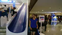Keseruan Tontowi Jajal Perosotan di Arena Indonesia Open 2017 