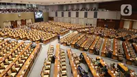 Suasana Rapat Paripurna ke-11 Masa Persidangan II Tahun Sidang 2021-2022 di Kompleks Parlemen, Jakarta, Kamis (16/12/2021). Rapat mengesahkan UU tentang perubahan atas UU Nomor 38 Tahun 2004 tentang Jalan serta penutupan Masa Persidangan II Tahun Sidang 2021-2022. (Liputan6.com/Angga Yuniar)