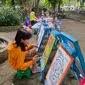 Para pedagang di KIF Park menyediakan lapak edukasi bagi anak-anak, salah satunya adalah melukis kanvas (Liputan6.com / Nefri Inge)
