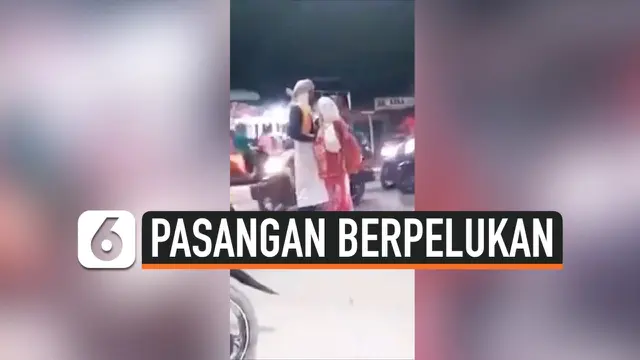 VIDEO: Pasangan Berpelukan Dibawa ke Kantor Polisi