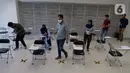 Sejumlah karyawan melakukan training di Suntory Garuda, Jakarta, Senin (8/8/2020). Perusahaan tersebut menerapkan protokol kesehatan saat hari pertama kerja di masa PSBB transisi yang diterapkan oleh Pemprov DKI Jakarta. (Liputan6.com/Herman Zakharia)