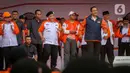 Presiden Partai Keadilan Sejahtera (PKS) Ahmad Syaikhu (baret hitam) bersama jajaran dan bakal calon presiden yang diusung PKS Anies Baswedan saat Apel Siaga Pemenangan PKS 2024 di Stadion Madya Kompleks GBK, Jakarta, Minggu (26/2/2023). PKS menggelar apel siaga pemenangan untuk Pemilu 2024 yang merupakan rangkaian Rakernas PKS 2023. (Liputan6.com/Faizal Fanani)