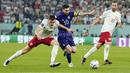 <p>Argentina berhasil melangkah ke 16 besar Piala Dunia 2022 sebagai juara grup setelah menang 2-0 atas Polandia dalam laga terakhir Grup C Piala Dunia 2022 yang berlangsung di Stadium 974, Doha, Kamis (1/12/2022) dini hari WIB. (AP/Natacha Pisarenko)</p>
