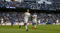 Bintang Real Madrid Cristiano Ronaldo merayakan golnya ke gawang Getafe (REUTER/Juan Medina)