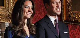 Pangeran William dan Kate Middleton berpose selama sesi pemotretan untuk menandai pertunangan mereka di State Rooms of St James's Palace, London, Inggris, 16 November 2010. (BEN STANSALL/AFP)