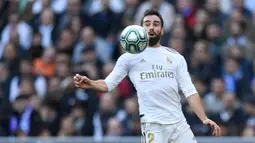 2. Dani Carvajal - Bek kanan asal Spanyol ini tampil konsisten bersama Real Madrid. Memiliki kemapuan dalam umpan silang yang baik,  Carvajal turut menyumbangkan delapan assist dari 41 penampilan bersama Real Madrid musim ini. (AFP/Oscar Del Pozo)