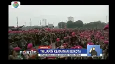 Ribuan personel TNI menggelar apel pasca-pemilu di Monas, Jakarta. Apel menandakan situasi kondusif pemilu.