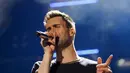 Vokalis Maroon 5 ini dikenal sebagai pecinta t-shirt, ia tampil ‘simple’ namun tetap keren tampil di atas panggung. (Bintang/EPA)