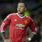 5. Memphis Depay, top skor Liga Belanda musim lalu itu didatangkan MU dengan harga 27,5 juta poundsterling. Namun hingga pekan ke-25 dirinya tak kunjung berkembang, bahkan kini mulai sering menjadi penghangat bangku cadangan. (AFP/Oli Scarff)