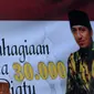 Ketua Umum AMPG, Fahd El Fouz A Rafiq memberikan pidato jelang buka puasa bersama ribuan anak yatim piatu di Jakarta, Sabtu (18/6). Acara diikuti sekitar 26 ribu anak yatim piatu. (Liputan6.com/Helmi Fithriansyah)