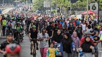 Warga berolahraga saat car free day di kawasan Bundaran HI, Jakarta, Minggu (4/12/2022). Menurut Kementerian Kesehatan, mayoritas masyarakat Indonesia sudah memiliki antibodi terhadap COVID-19 baik melalui infeksi maupun lewat program vaksinasi virus corona. (Liputan6.com/Faizal Fanani)