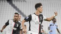 Bintang Juventus Cristiano Ronaldo merayakan golnya ke gawang Lazio pada pekan ke-34 Liga Italia di Allianz Stadium, Selasa (21/7/2020) dini hari WIB. (Marco Alpozzi/LaPresse via AP)